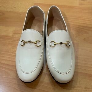 White Loafers with Gold Hardware